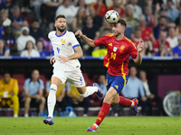 Aymeric Laporte centre-back of Spain and Al-Nassr FC and Olivier Giroud centre-forward of France and AC Milan compete for the ball during th...