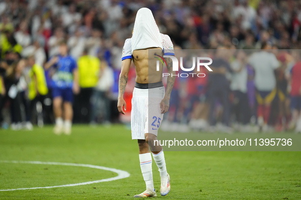 Bradley Barcola left winger of France and Paris Saint-Germain dejected after losing the UEFA EURO 2024 semi-final match between Spain v Fran...