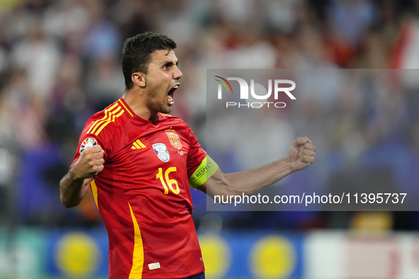 Rodrigo Hernandez defensive midfield of Spain and Manchester City celebrates victory after the UEFA EURO 2024 semi-final match between Spain...