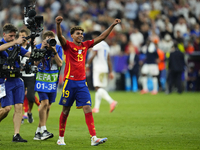 Lamine Yamal right winger of Spain and FC Barcelona celebrates victory after the UEFA EURO 2024 semi-final match between Spain v France at M...