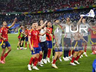 Spanish players celebrate victory after the UEFA EURO 2024 semi-final match between Spain v France at Munich Football Arena on July 9, 2024...