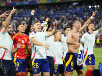 Spanish players celebrate victory after the UEFA EURO 2024 semi-final match between Spain v France at Munich Football Arena on July 9, 2024...