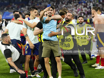 Security personnel injure Alvaro Morata centre-forward of Spain and Atletico de Madrid when antry a pitch invader after the UEFA EURO 2024 s...