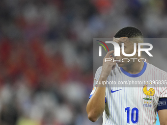 Kylian Mbappe centre-forward of France and Real Madrid reacts during the UEFA EURO 2024 semi-final match between Spain v France at Munich Fo...