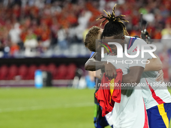 Nico Williams left winger of Spain and Athletic Club Bilbao celebrates victory after the UEFA EURO 2024 semi-final match between Spain v Fra...