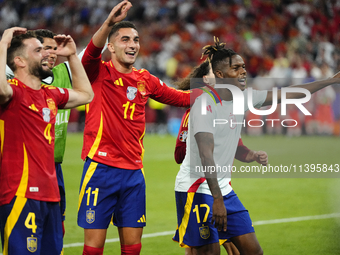 Ferran Torres left winger of Spain and FC Barcelona and Nico Williams left winger of Spain and Athletic Club Bilbao celebrate victory after...