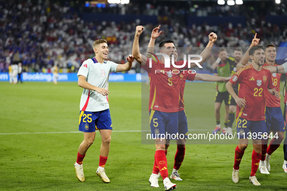 Dani Vivian centre-back of Spain and Athletic Club Bilbao celebrates victory after the UEFA EURO 2024 semi-final match between Spain v Franc...