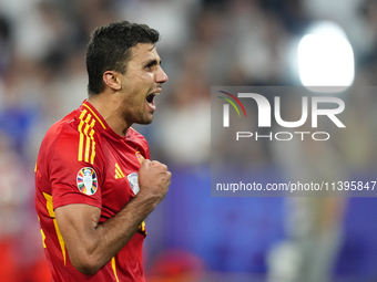 Rodrigo Hernandez defensive midfield of Spain and Manchester City celebrates victory after the UEFA EURO 2024 semi-final match between Spain...