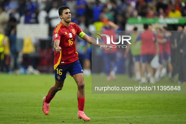 Rodrigo Hernandez defensive midfield of Spain and Manchester City celebrates victory after the UEFA EURO 2024 semi-final match between Spain...