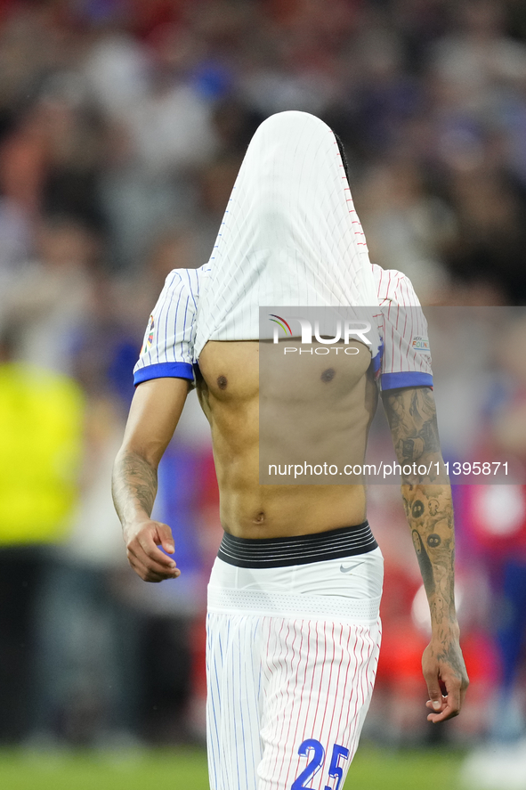 Bradley Barcola left winger of France and Paris Saint-Germain dejected after losing the UEFA EURO 2024 semi-final match between Spain v Fran...