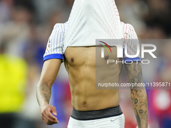 Bradley Barcola left winger of France and Paris Saint-Germain dejected after losing the UEFA EURO 2024 semi-final match between Spain v Fran...