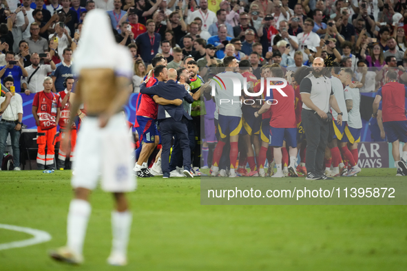 Spanish players celebrate victory after the UEFA EURO 2024 semi-final match between Spain v France at Munich Football Arena on July 9, 2024...