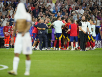 Spanish players celebrate victory after the UEFA EURO 2024 semi-final match between Spain v France at Munich Football Arena on July 9, 2024...