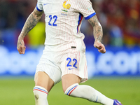 Theo Hernandez eft-back of France and AC Milan during the UEFA EURO 2024 semi-final match between Spain v France at Munich Football Arena on...