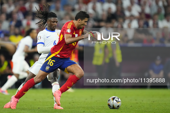 Eduardo Camavinga central midfield of France and Real Madrid and Rodrigo Hernandez defensive midfield of Spain and Manchester City compete f...