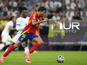 Eduardo Camavinga central midfield of France and Real Madrid and Rodrigo Hernandez defensive midfield of Spain and Manchester City compete f...