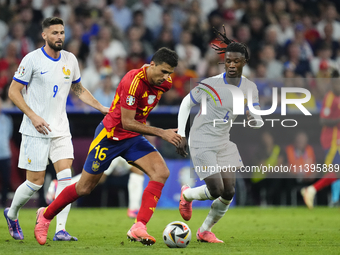 Eduardo Camavinga central midfield of France and Real Madrid and Rodrigo Hernandez defensive midfield of Spain and Manchester City compete f...