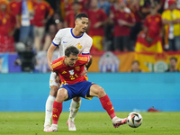 Mikel Oyarzabal centre-forward of Spain and Real Sociedad and William Saliba centre-back of France and Arsenal FC compete for the ball durin...