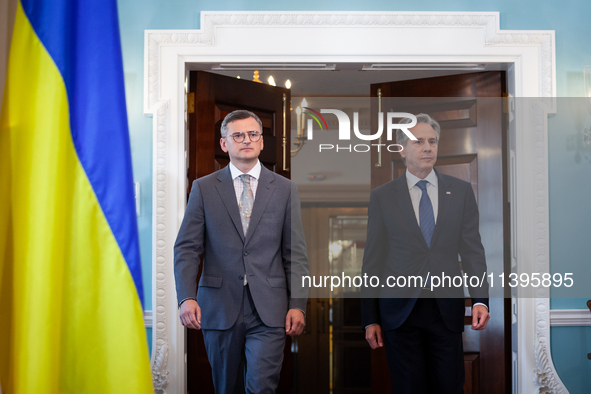 Foreign Minister Dmytro Kuleba of Ukraine (left) and Secretary of State Antony Blinken make statements to the press following a meeting at t...