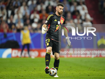 Unai Simon goalkeeper Athletic Club Bilbao controls the ball during the UEFA EURO 2024 semi-final match between Spain v France at Munich Foo...