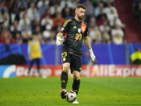 Unai Simon goalkeeper Athletic Club Bilbao controls the ball during the UEFA EURO 2024 semi-final match between Spain v France at Munich Foo...