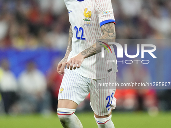 Theo Hernandez eft-back of France and AC Milan during the UEFA EURO 2024 semi-final match between Spain v France at Munich Football Arena on...