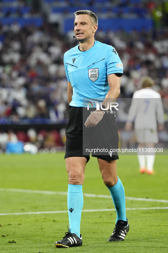 Referee Slavko Vincic during the UEFA EURO 2024 semi-final match between Spain v France at Munich Football Arena on July 9, 2024 in Munich,...