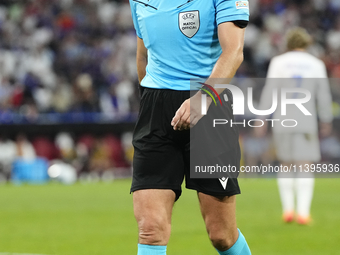 Referee Slavko Vincic during the UEFA EURO 2024 semi-final match between Spain v France at Munich Football Arena on July 9, 2024 in Munich,...