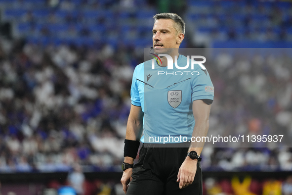 Referee Slavko Vincic during the UEFA EURO 2024 semi-final match between Spain v France at Munich Football Arena on July 9, 2024 in Munich,...