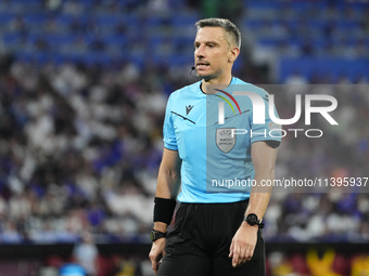 Referee Slavko Vincic during the UEFA EURO 2024 semi-final match between Spain v France at Munich Football Arena on July 9, 2024 in Munich,...