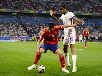 Dani Vivian centre-back of Spain and Athletic Club Bilbao and Bradley Barcola left winger of France and Paris Saint-Germain compete for the...