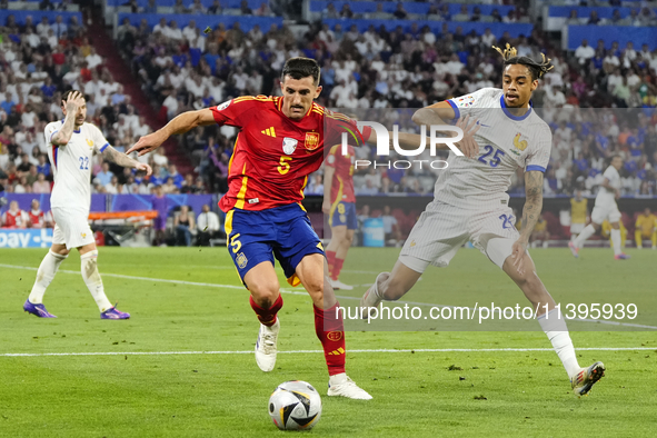 Dani Vivian centre-back of Spain and Athletic Club Bilbao and Bradley Barcola left winger of France and Paris Saint-Germain compete for the...