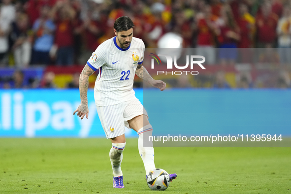 Theo Hernandez eft-back of France and AC Milan during the UEFA EURO 2024 semi-final match between Spain v France at Munich Football Arena on...