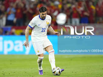 Theo Hernandez eft-back of France and AC Milan during the UEFA EURO 2024 semi-final match between Spain v France at Munich Football Arena on...