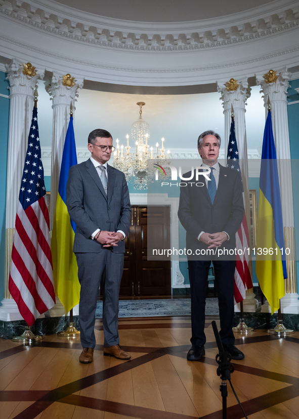 Foreign Minister Dmytro Kuleba of Ukraine (left) and Secretary of State Antony Blinken make statements to the press following a meeting at t...