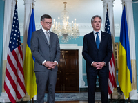 Foreign Minister Dmytro Kuleba of Ukraine (left) and Secretary of State Antony Blinken make statements to the press following a meeting at t...