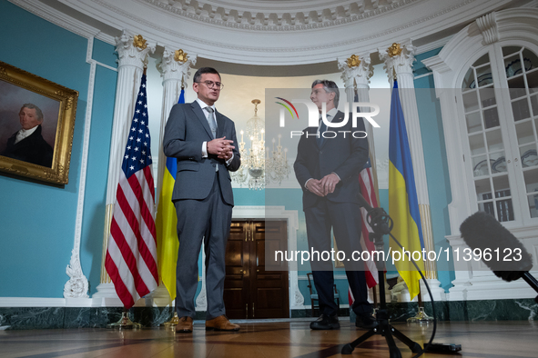 Foreign Minister Dmytro Kuleba of Ukraine (left) and Secretary of State Antony Blinken make statements to the press following a meeting at t...