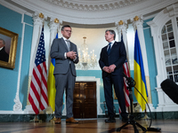 Foreign Minister Dmytro Kuleba of Ukraine (left) and Secretary of State Antony Blinken make statements to the press following a meeting at t...