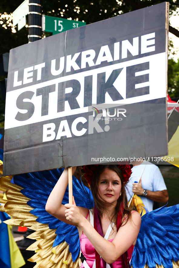 Ukrainians and supporters attend solidarity with Ukraine demonstration in front of the Washington Monument during the 75th NATO Summit in Wa...