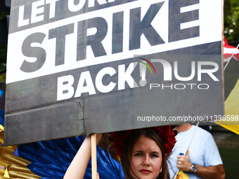 Ukrainians and supporters attend solidarity with Ukraine demonstration in front of the Washington Monument during the 75th NATO Summit in Wa...