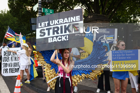 Ukrainians and supporters attend solidarity with Ukraine demonstration in front of the Washington Monument during the 75th NATO Summit in Wa...