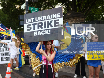 Ukrainians and supporters attend solidarity with Ukraine demonstration in front of the Washington Monument during the 75th NATO Summit in Wa...