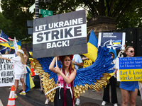 Ukrainians and supporters attend solidarity with Ukraine demonstration in front of the Washington Monument during the 75th NATO Summit in Wa...