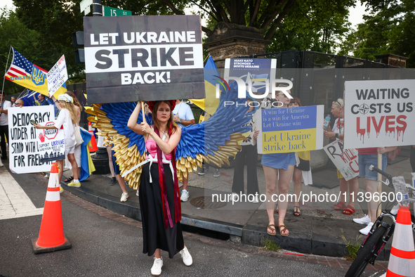 Ukrainians and supporters attend solidarity with Ukraine demonstration in front of the Washington Monument during the 75th NATO Summit in Wa...