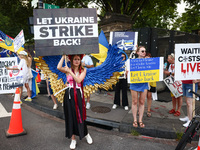 Ukrainians and supporters attend solidarity with Ukraine demonstration in front of the Washington Monument during the 75th NATO Summit in Wa...