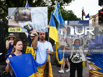 Ukrainians and supporters attend solidarity with Ukraine demonstration in front of the Washington Monument during the 75th NATO Summit in Wa...