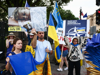 Ukrainians and supporters attend solidarity with Ukraine demonstration in front of the Washington Monument during the 75th NATO Summit in Wa...