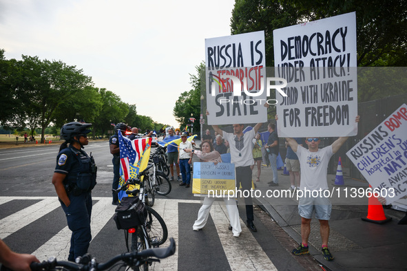 Ukrainians and supporters attend solidarity with Ukraine demonstration in front of the Washington Monument during the 75th NATO Summit in Wa...