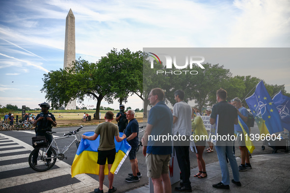 Ukrainians and supporters attend solidarity with Ukraine demonstration in front of the Washington Monument during the 75th NATO Summit in Wa...