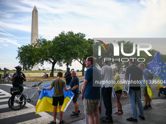 Ukrainians and supporters attend solidarity with Ukraine demonstration in front of the Washington Monument during the 75th NATO Summit in Wa...